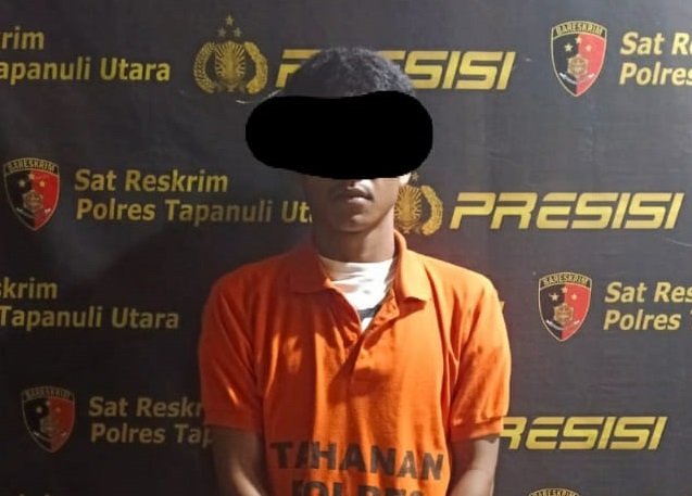 ES, 21, warga Taput tersangka persetubuhan anak di bawah umur ditahan Polres Taput. Waspada/ist