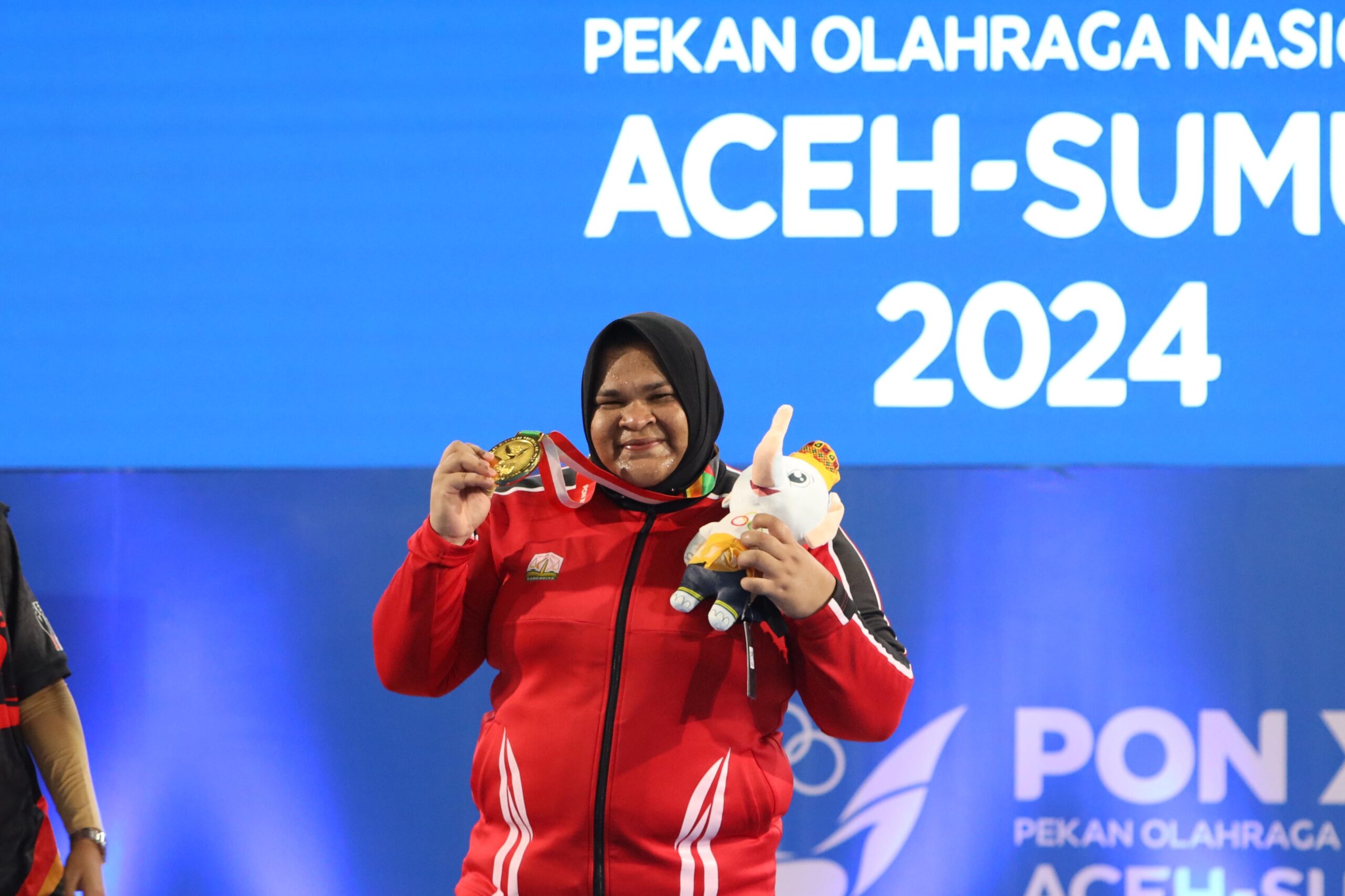 Nurul Akmal Pecahkan Rekor PON dan Rebut Medali Emas