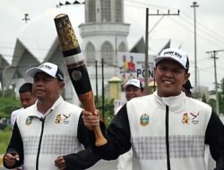 Ketika Bupati Dan Wabup Sergai Bawa Obor Api PON Sejauh 3 Km