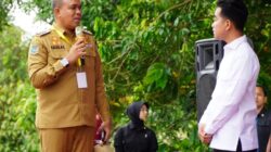 Pj Bupati Langkat Faisal Hasrimy di Desa Aman Damai, Selasa (24/12), lapor Wapres Gibran Rakabuming Raka soal pertanian di Kabupaten Langkat dan siap mendukung swasembada pangan pemerintahan Prabowo Subianto. Waspada/Ist