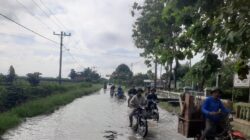 Jalan Pematang Bandar - Kerasaan Jadi Langganan Banjir, Warga Minta Bupati Turun Tangan