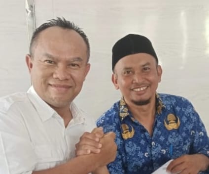 Kepala BPKD Aceh Tenggara, Syukur S. Karo Karo pakai peci. Waspada/Seh Muhammad Amin